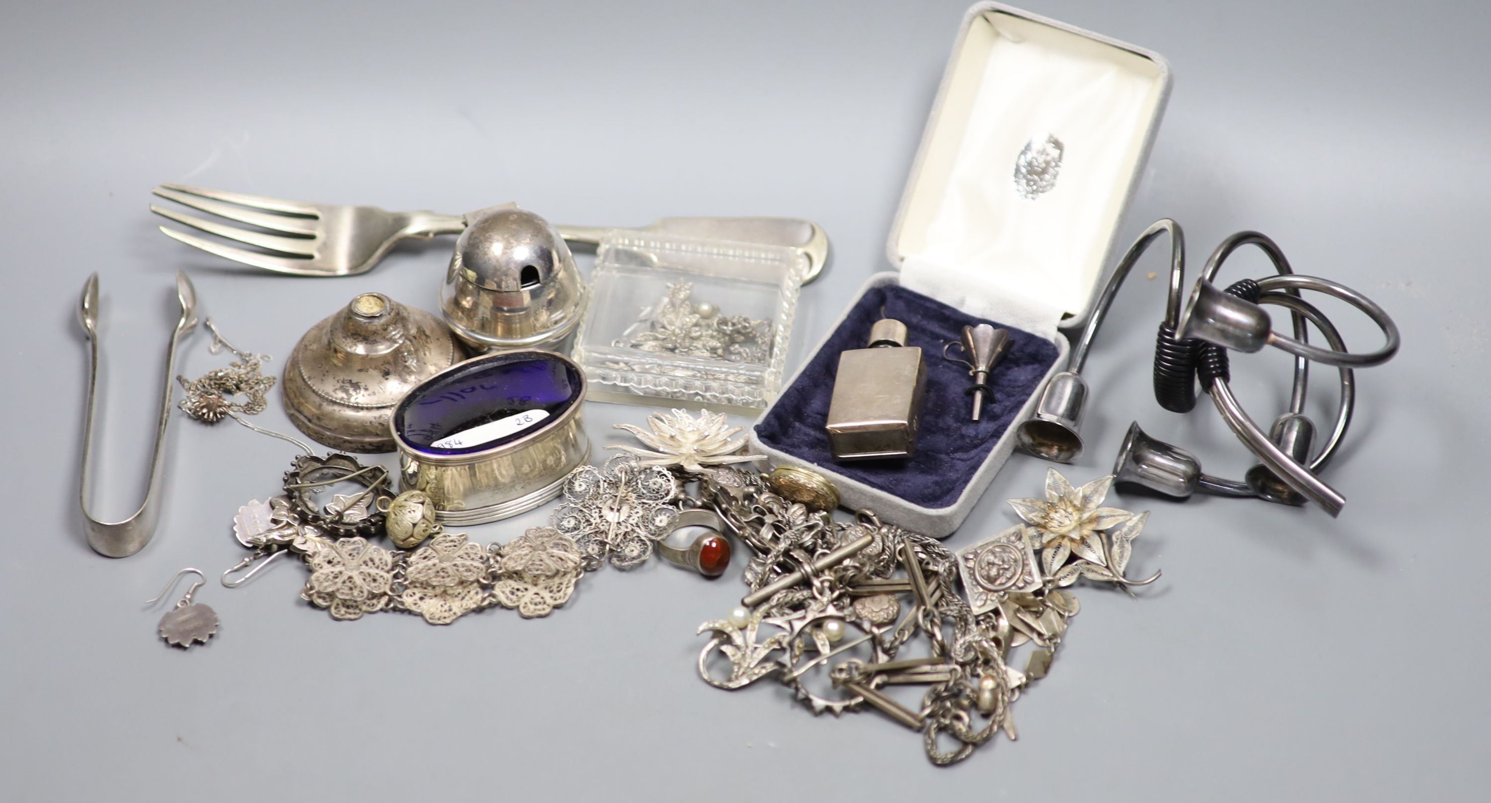 A group of assorted silver, white metal and plated items including jewellery and a pair of Svend Larsen miniature candelabra.